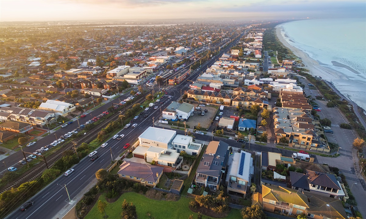 council depot with maintenance vehicles, industrial setting, blue tones